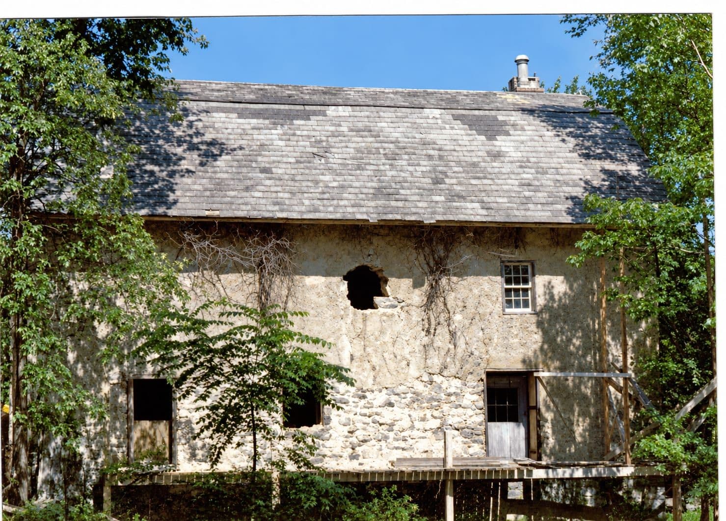 The same summer view of the uncovered stonework, colour and detail recovered